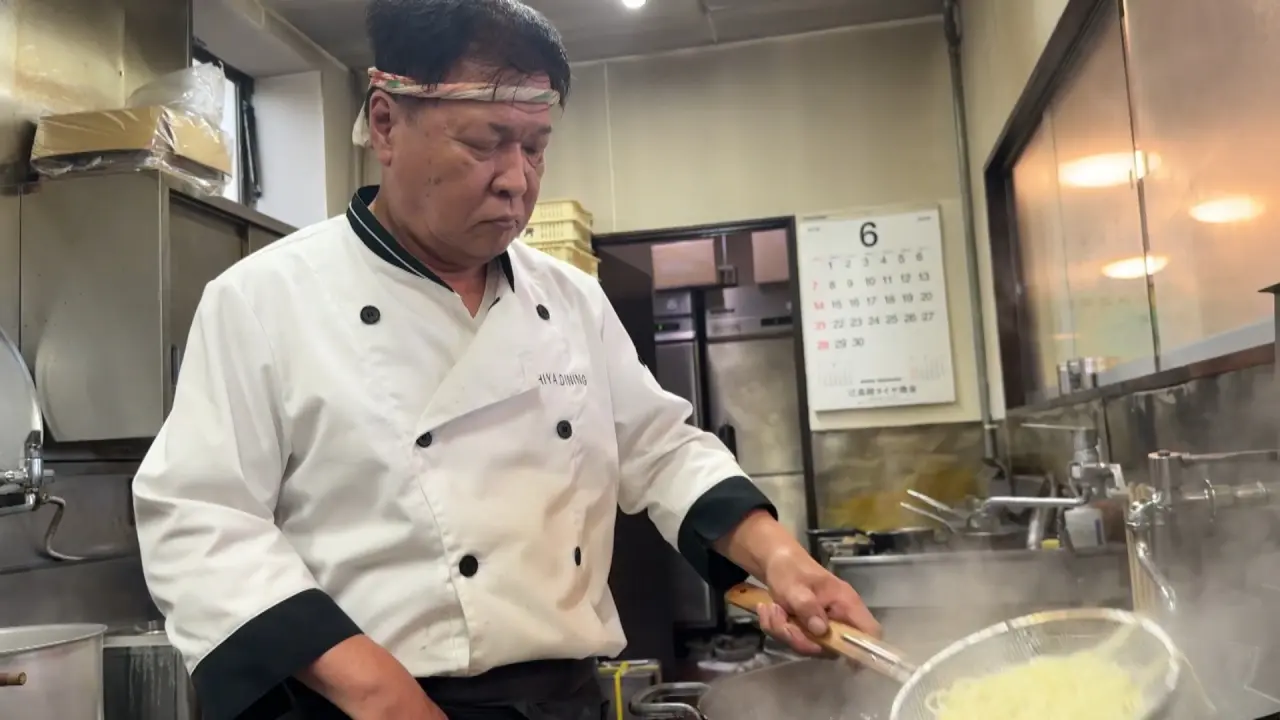 店主の堀彰さん